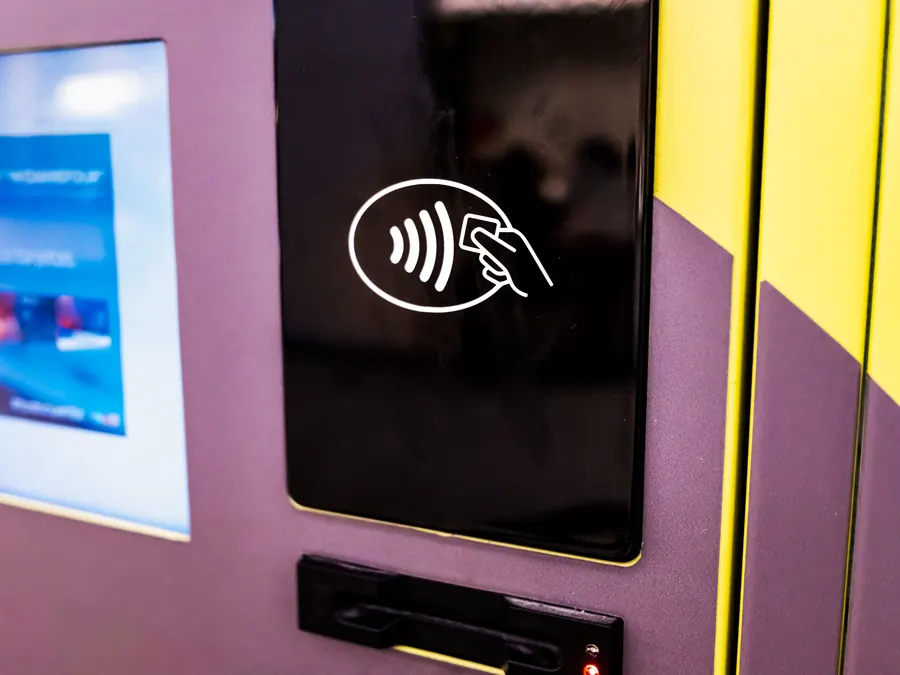 Cashless tap-to-pay card reader on a vending machine