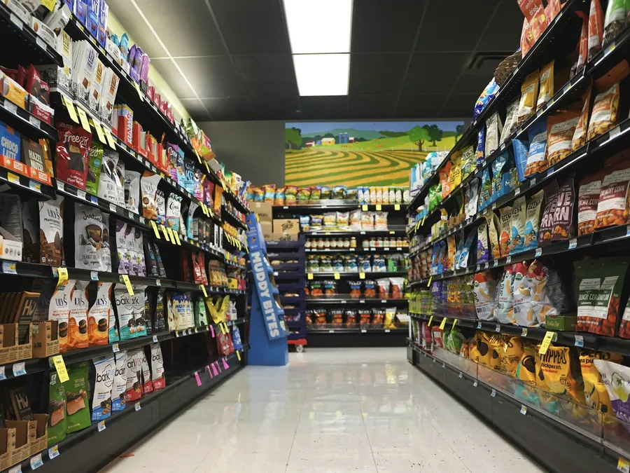 Self-checkout micro market shelves with fresh food and drinks