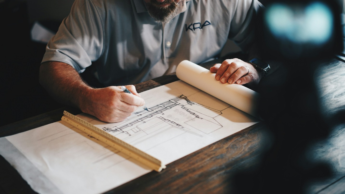 An architect working on a blueprint