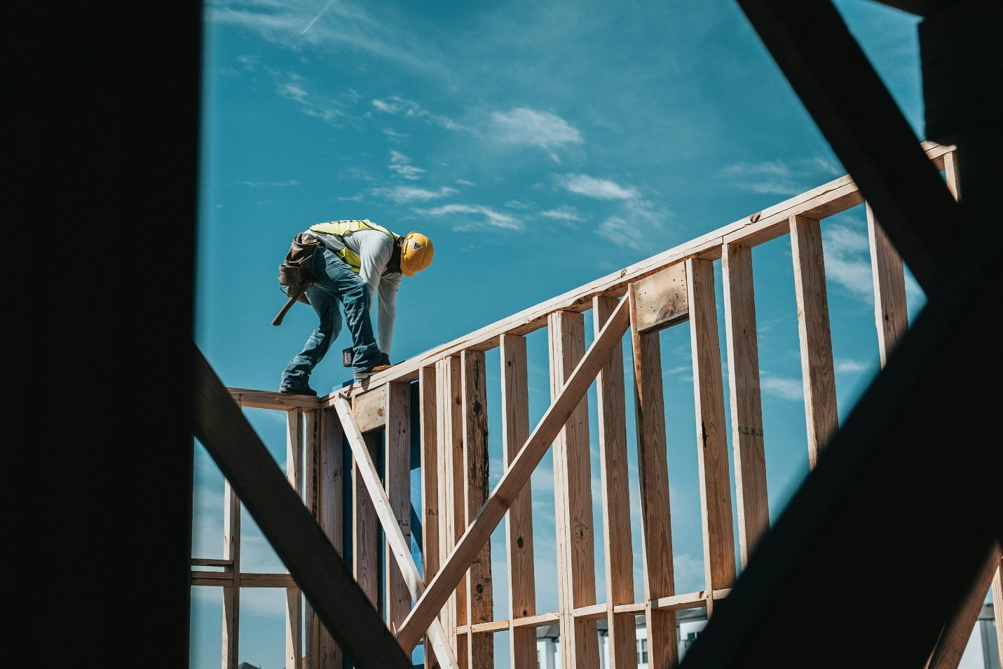 A construction worker wearing a yellow helmet