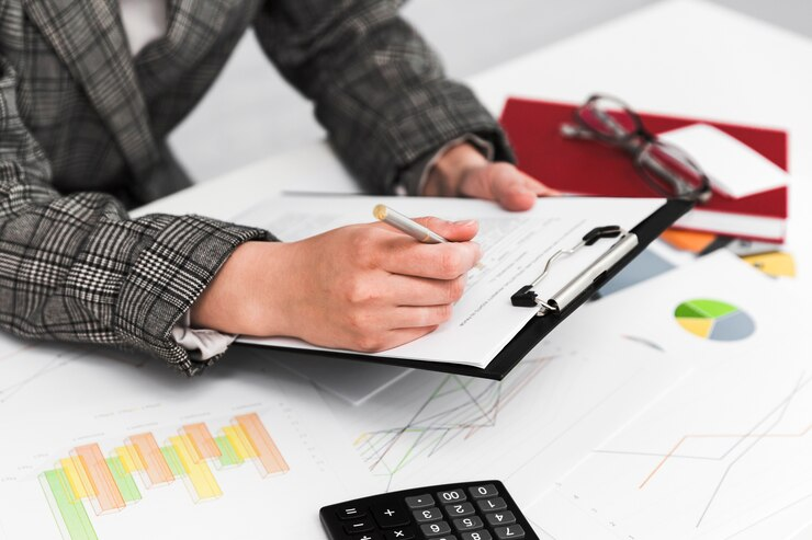 Businesswoman analyzing construction delay data